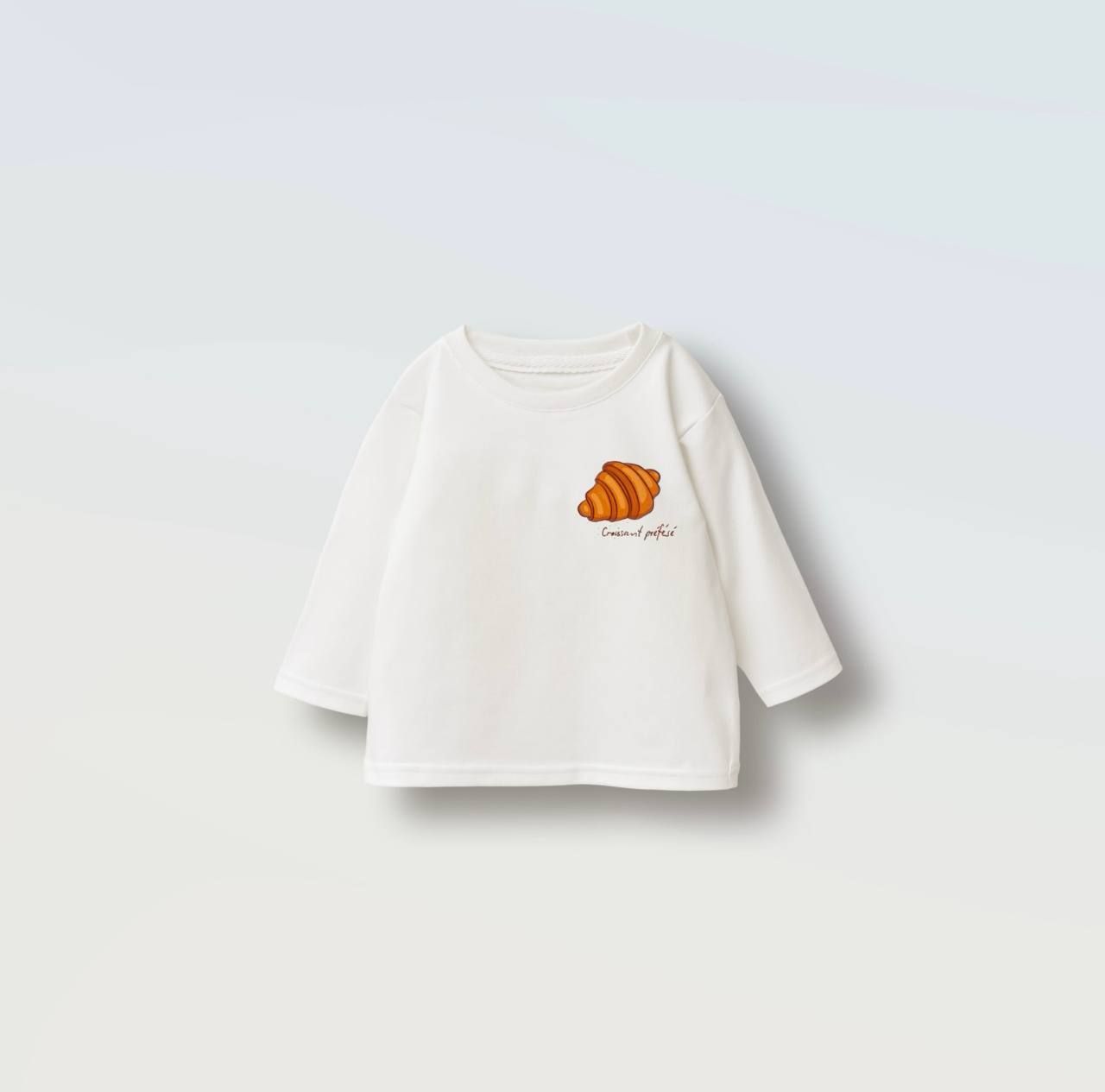 Молочний лонгслів Little Angel з принтом круасана